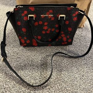 Michael Kors black Selma Medium leather handbag with red rose print pattern